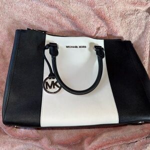 Michael Kors Sutton Center Stripe satchel in black and white saffiano leather